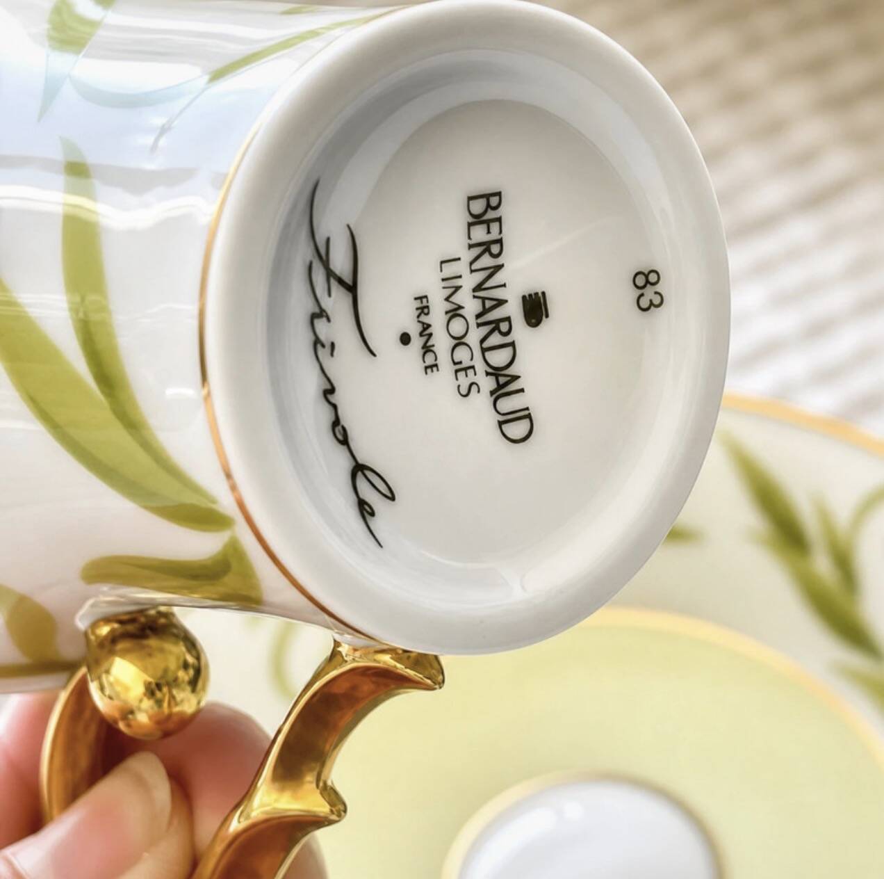 Bernardaud coffee/tea cup with saucer from the Frivole collection.