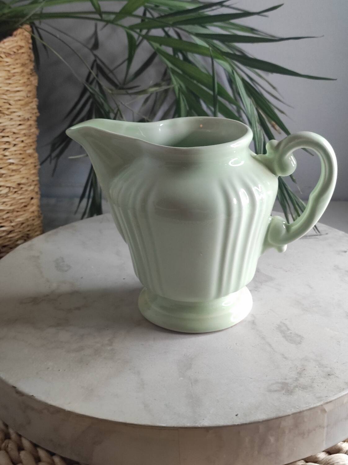 Green ceramic milk jug