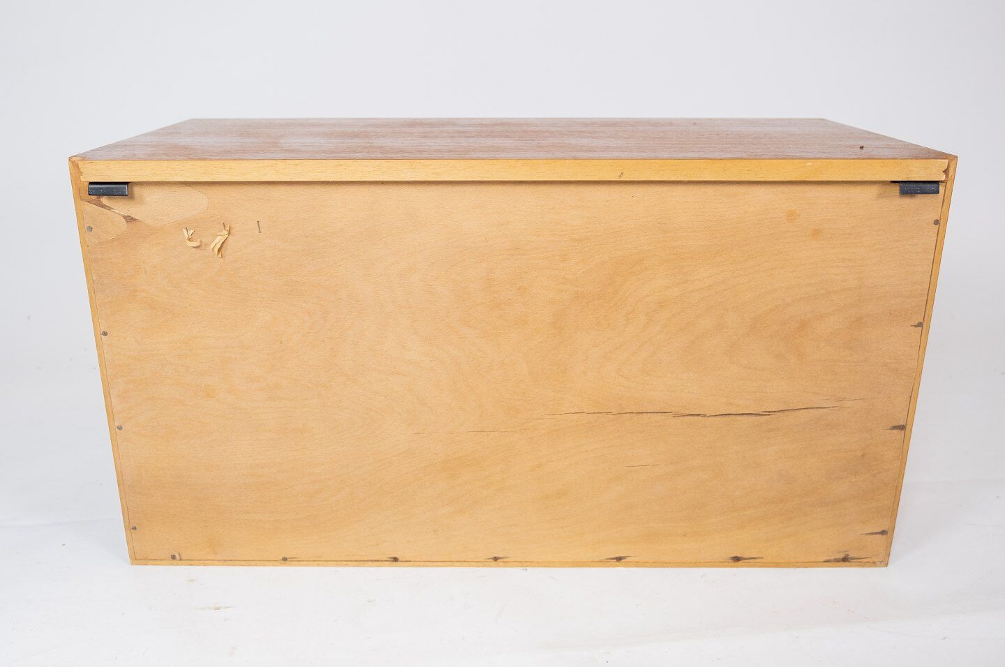 Wall mounted cabinet in teak of danish design from the 1960s.