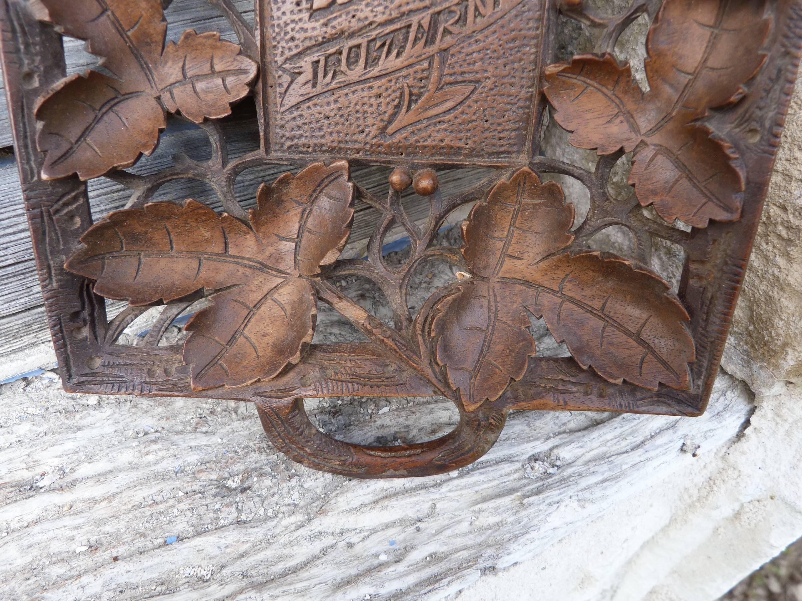 Small wooden tray cut out with leaf patterns