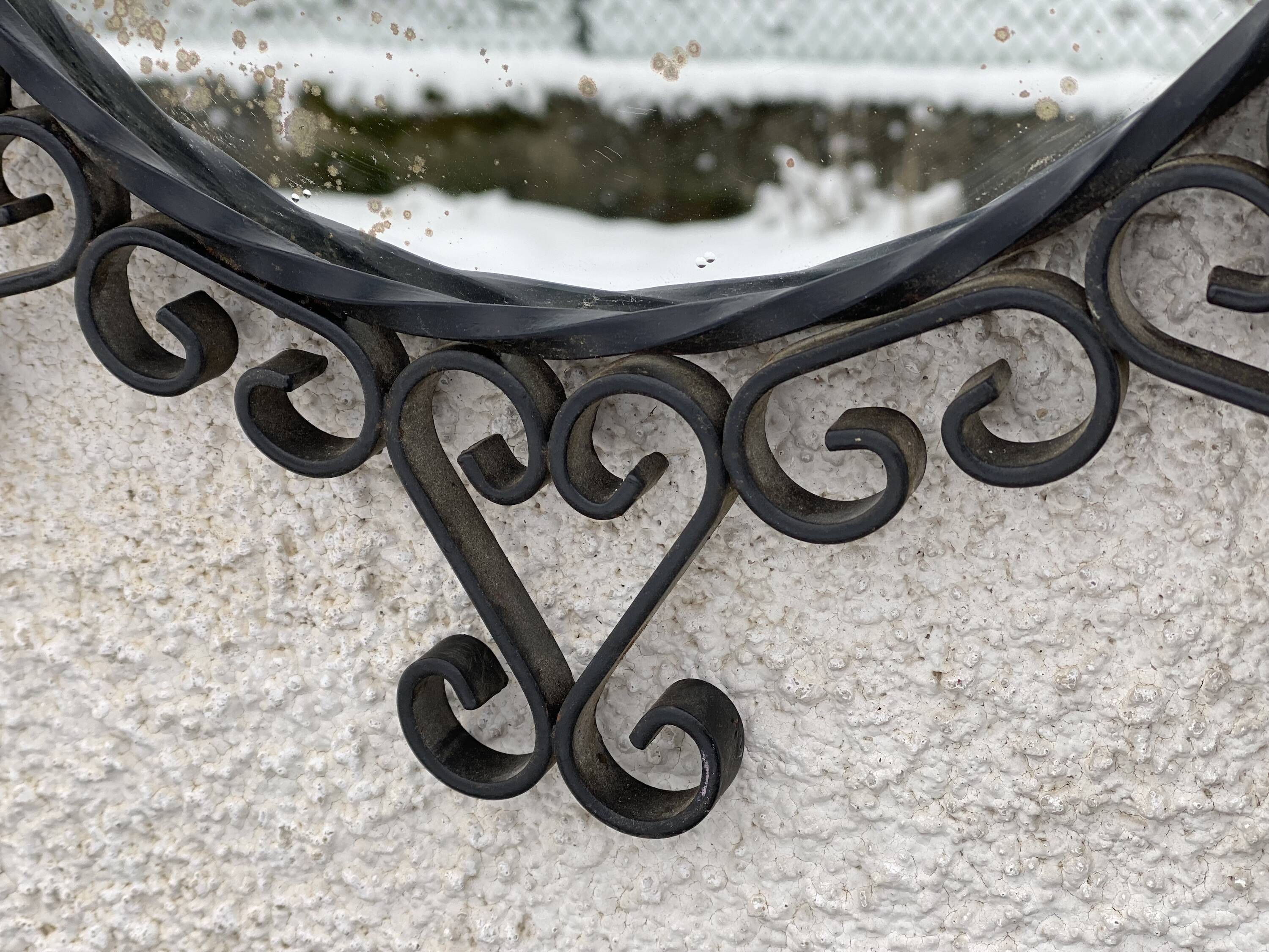 Vintage 1950s round metal mirror in the style of Chaty