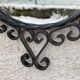 Vintage 1950s round metal mirror in the style of Chaty