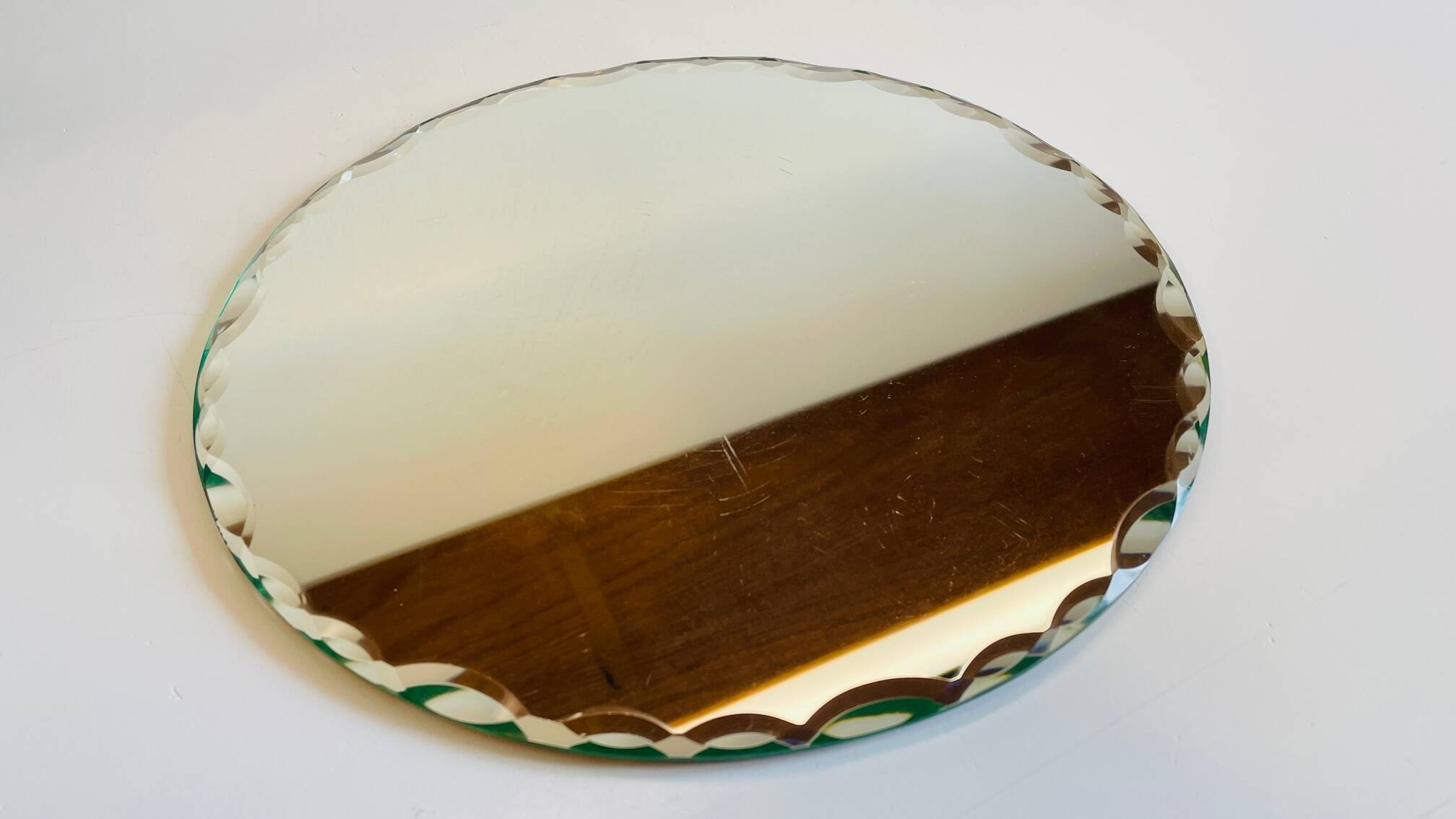 Vintage round and beveled table mirror