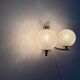 Simple two-armed wall light in brass and glass by Ball and Ball, Kaiser, 1960s, Germany.