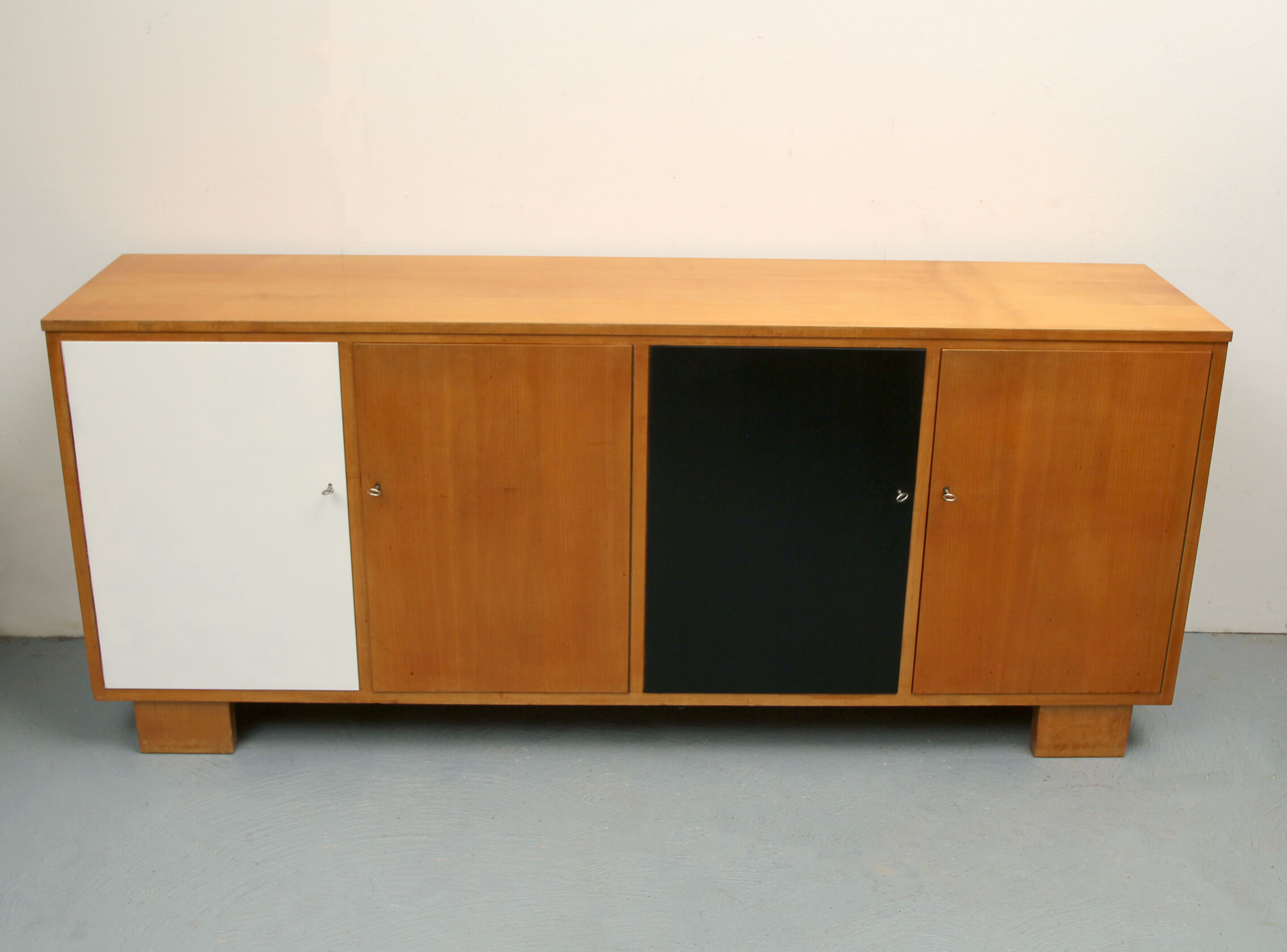 Sideboard in cherrywood with black and white doors 1950s