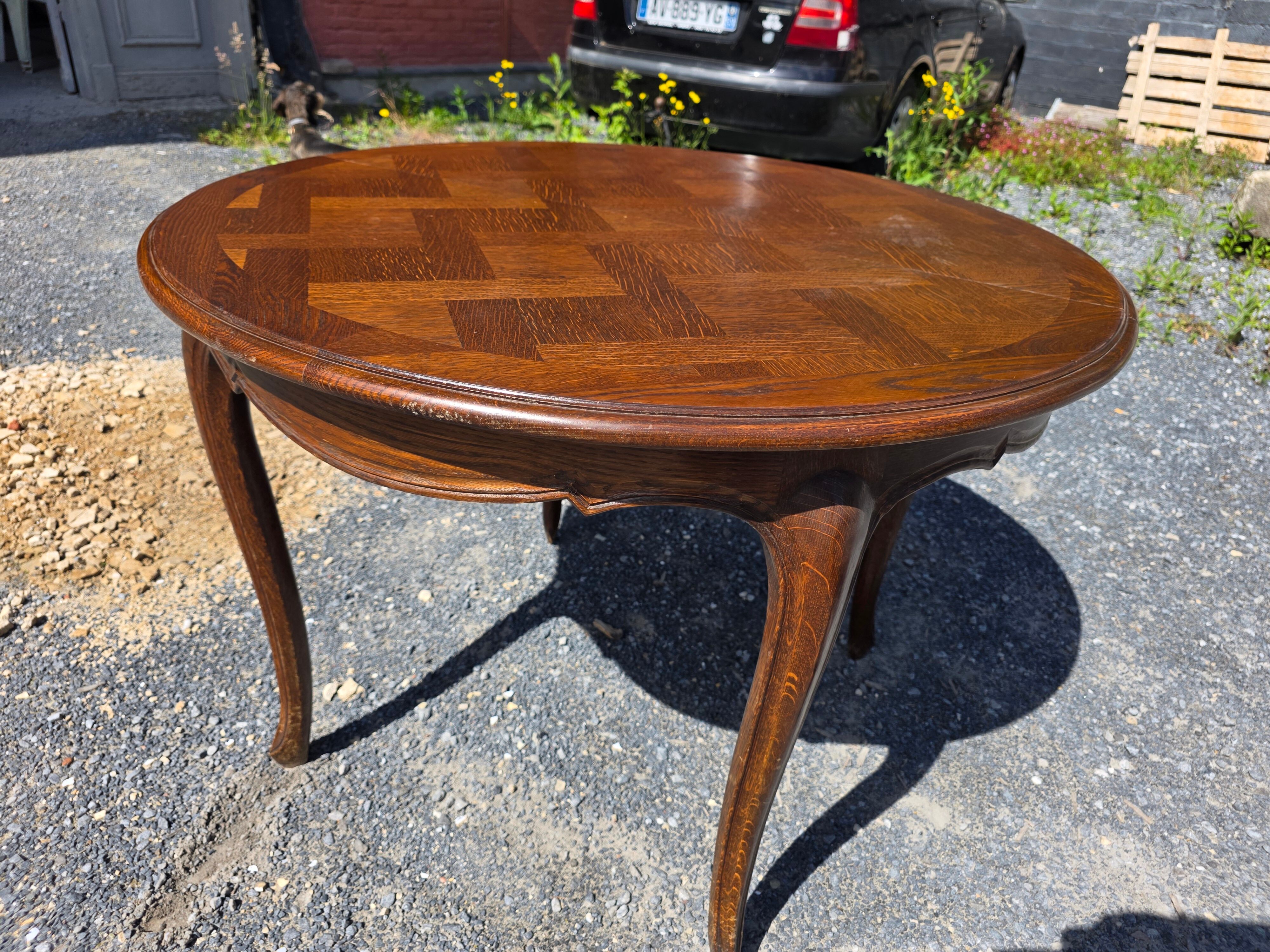 Extendable table in Louis XV style in oak (2 extensions)