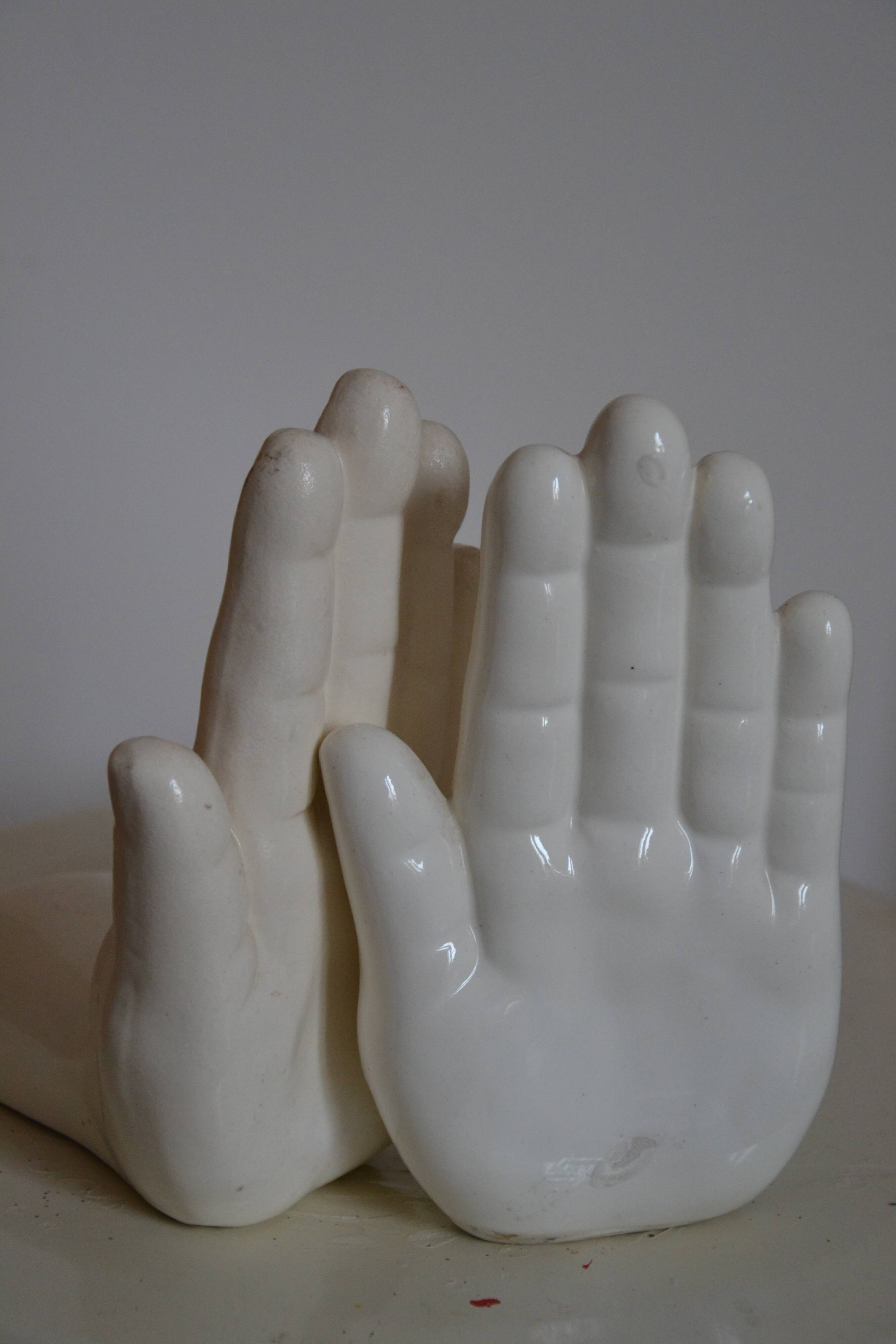 Handends in the shape of vintage white ceramic