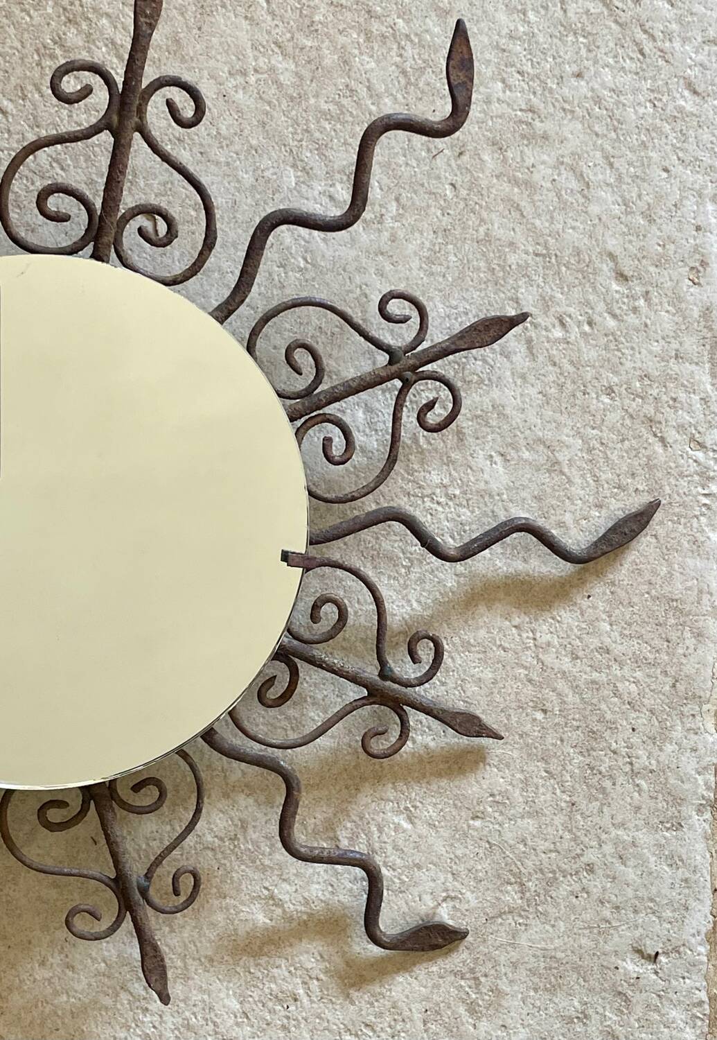 Luminous wrought iron sun mirror