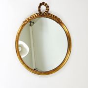 Round wall mirror in gilded wood, mid-century, C. Allodi & G. Subelli, Italy, 1950s.