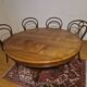 Round walnut table in solid wood, Napoleon III style with extensions - for 14 settings.