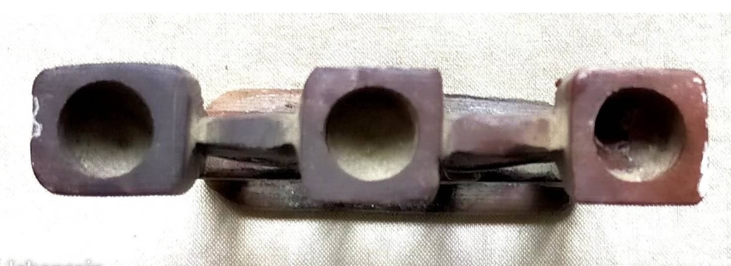 Three-branched stone candlestick adorned with birds, North Africa