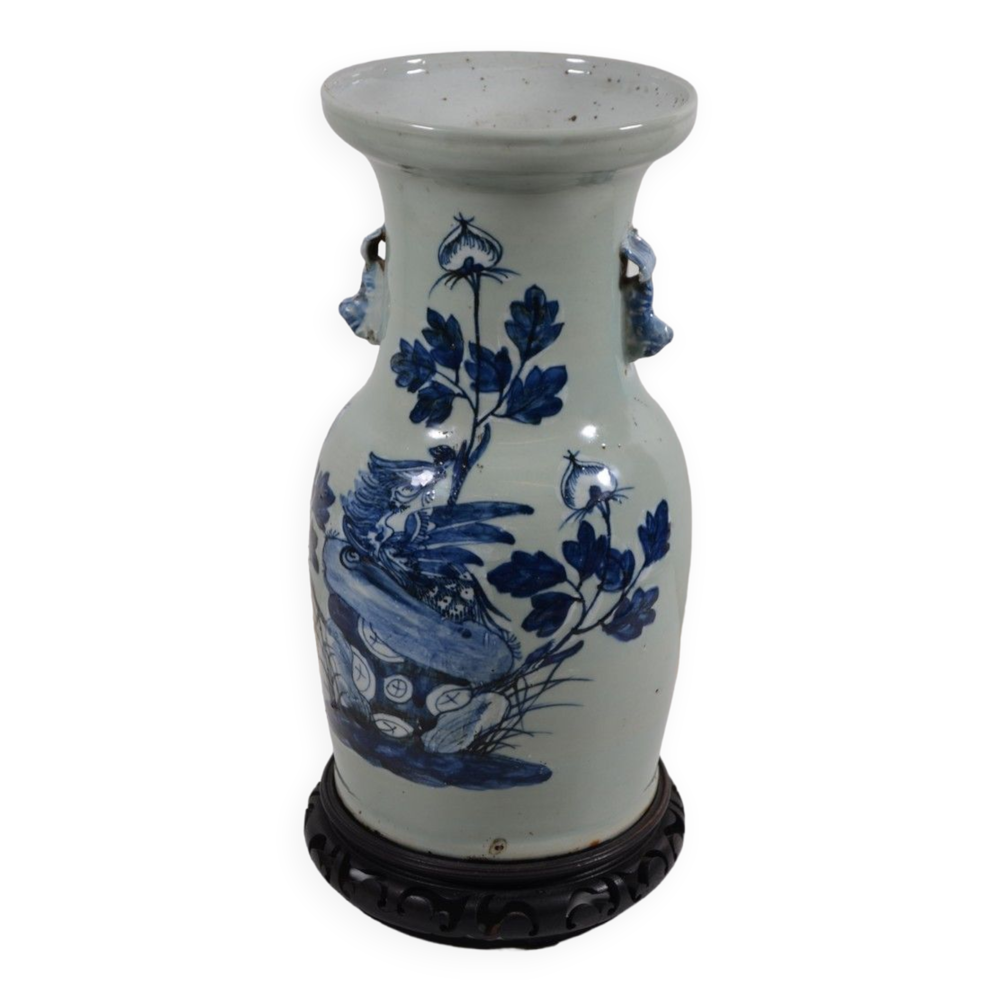 China. Porcelain mallet vase with blue and white phoenix decoration on a rock.