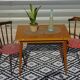 Scandinavian portfolio table model "half-century" by SAM