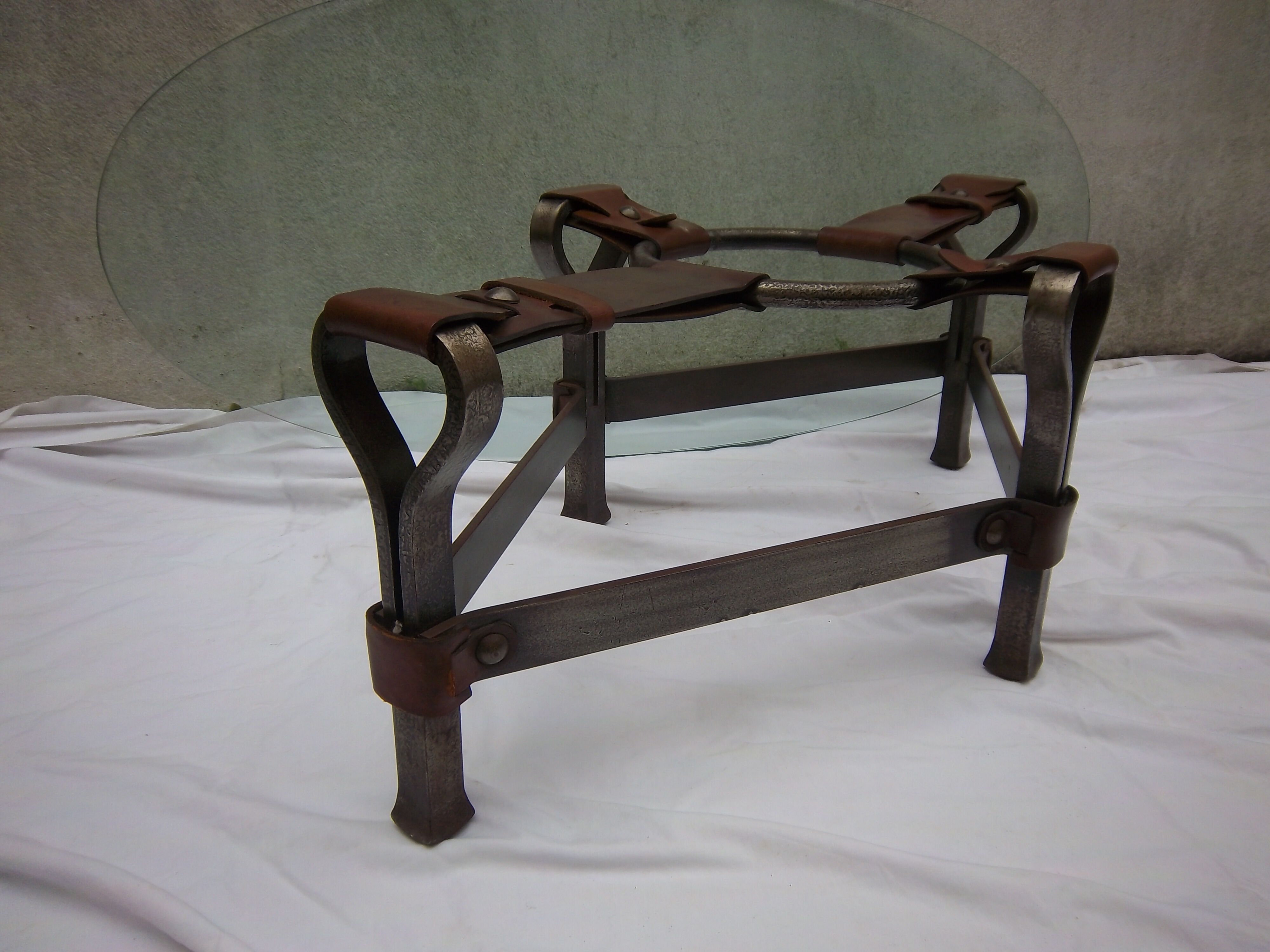 Year 1970 in wrought iron, leather and glass table