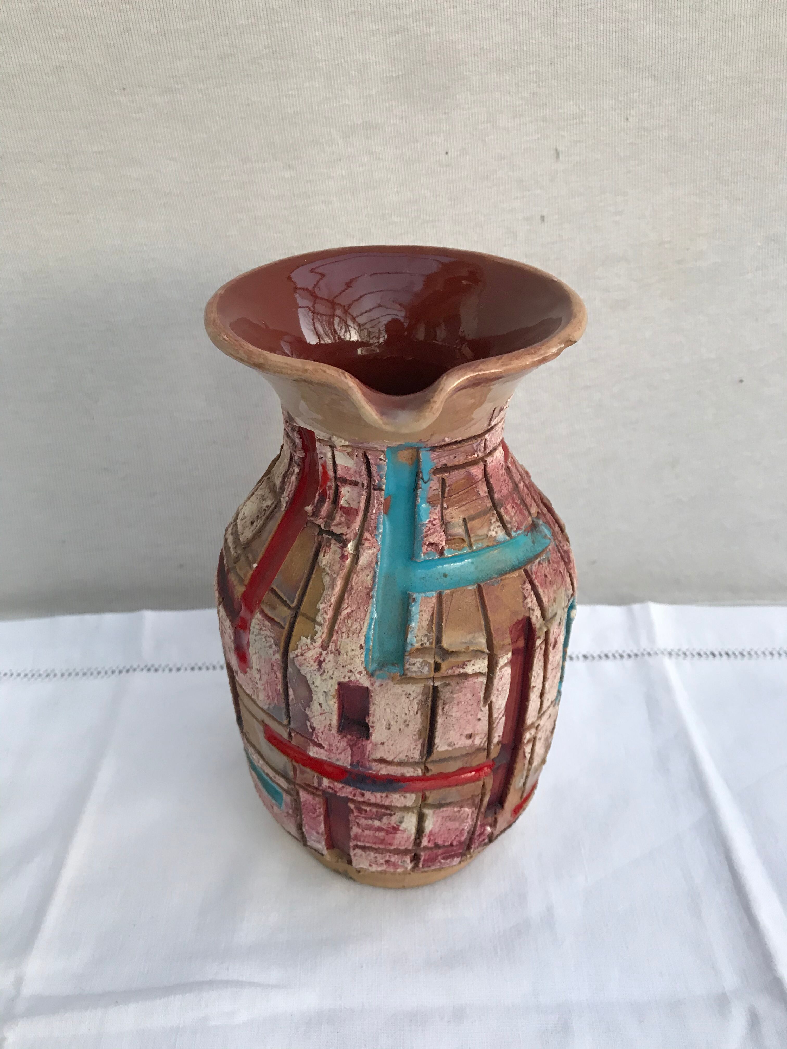 Former beige ceramic pitcher