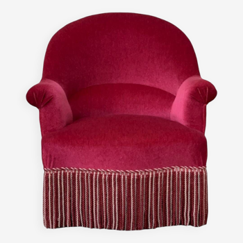Old raspberry velvet toad armchair