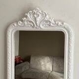 Late 19th century mirror with decorated pediment. 102x66.