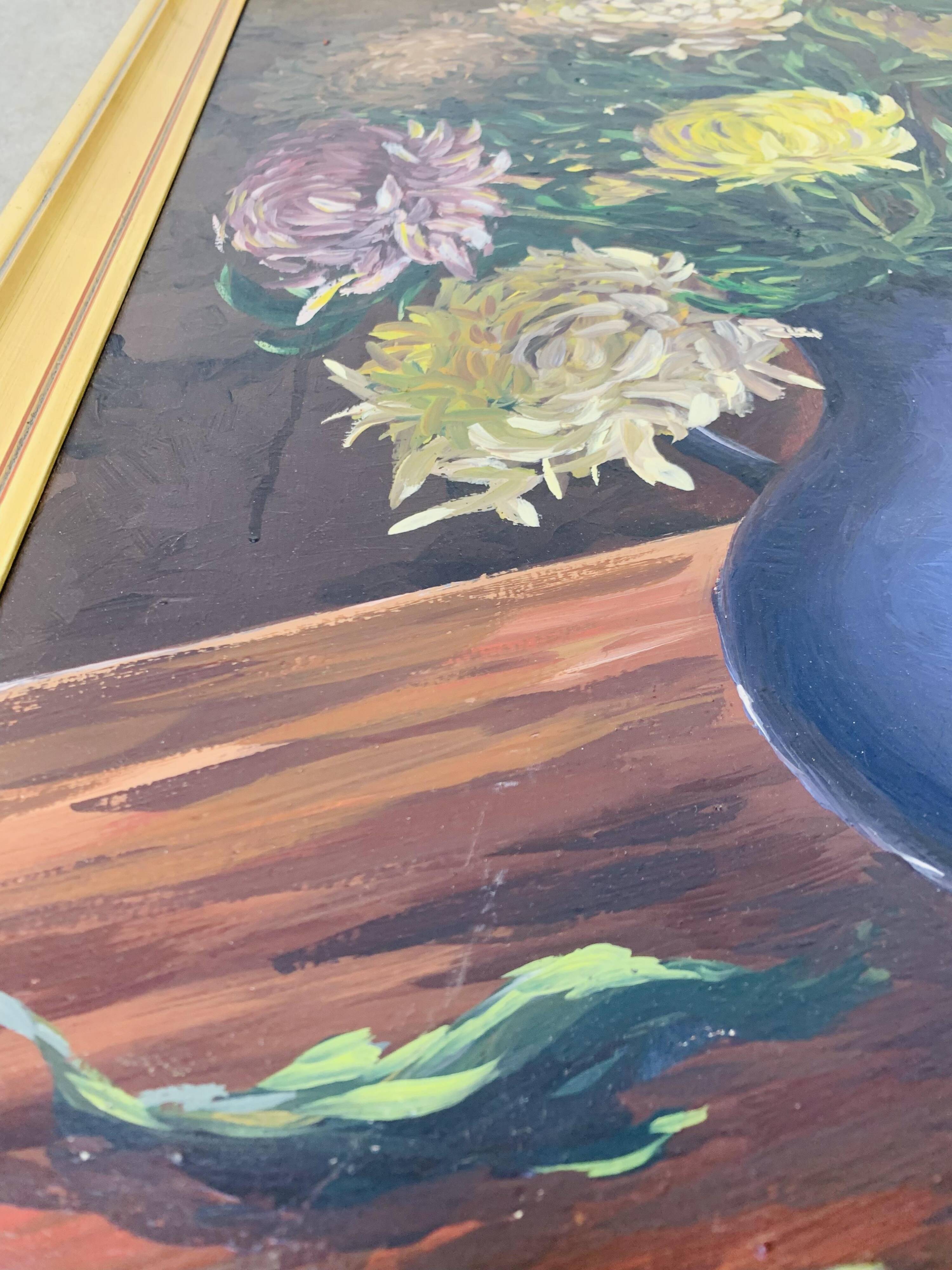 Still life painting of a bouquet of flowers, golden frame