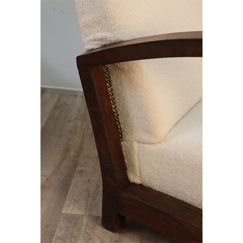 Pair of modernist armchairs in wood and buckle fabric, 1940