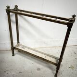 Brass and sheet metal umbrella stands from the 20th century.