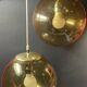 Pair of vintage smoked glass ball pendant lights from Biot glassworks