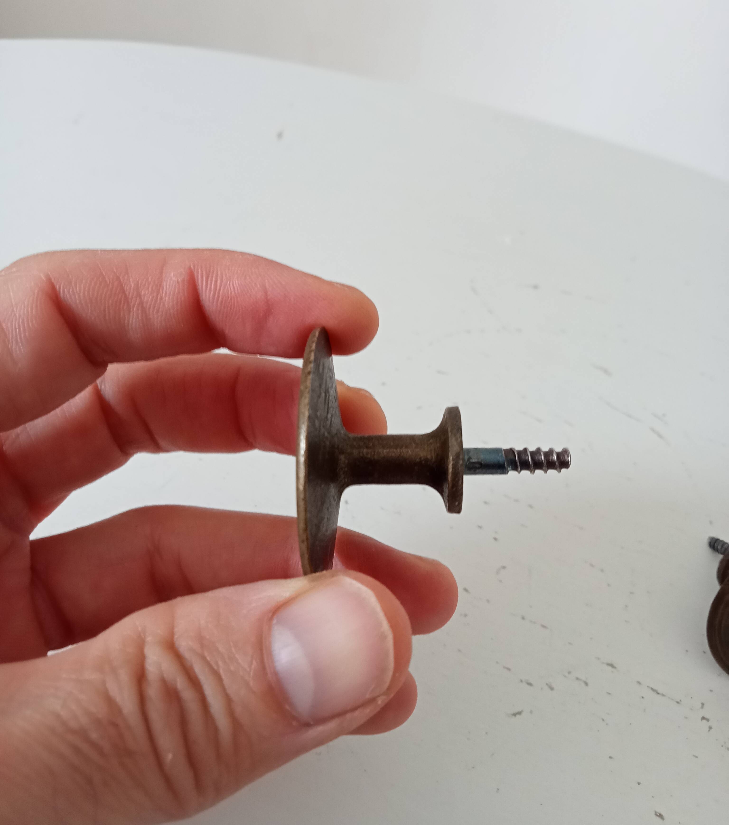 Pair of antique Empire furniture knobs from the 19th century.