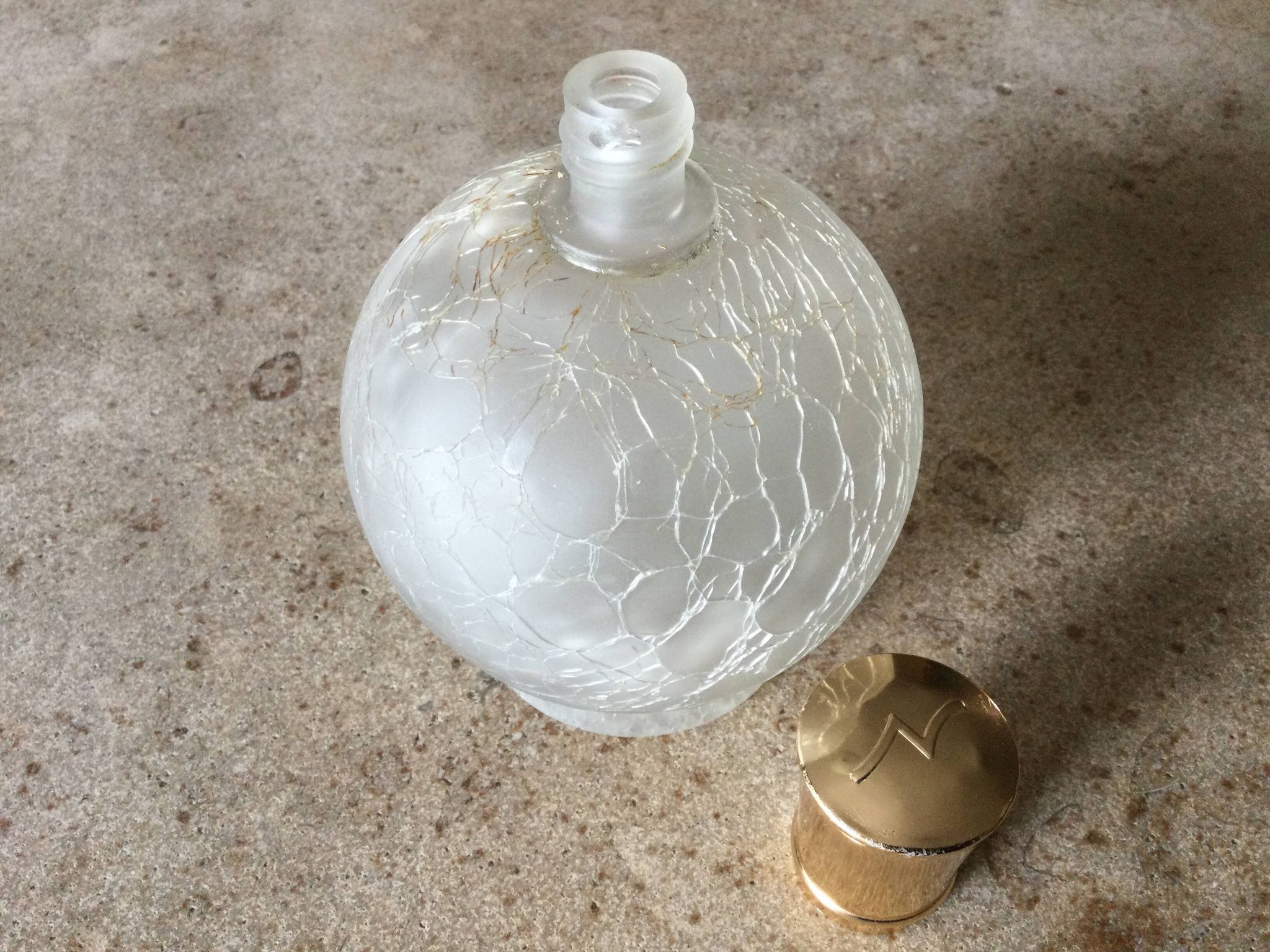 Cracked glass bottle