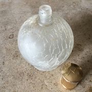 Cracked glass bottle