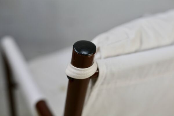 Fauteuil tubulaire, assise suspendue tissus. Circa 1970