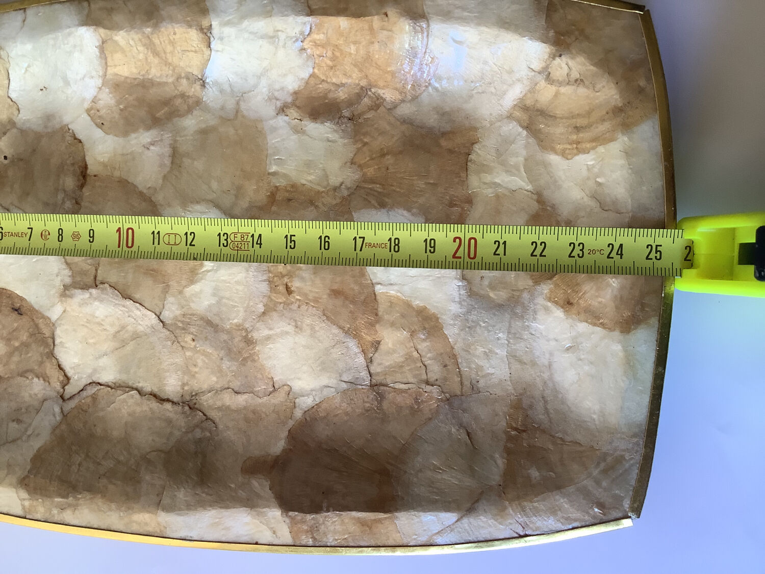 Top in mother-of-pearl and vintage brass