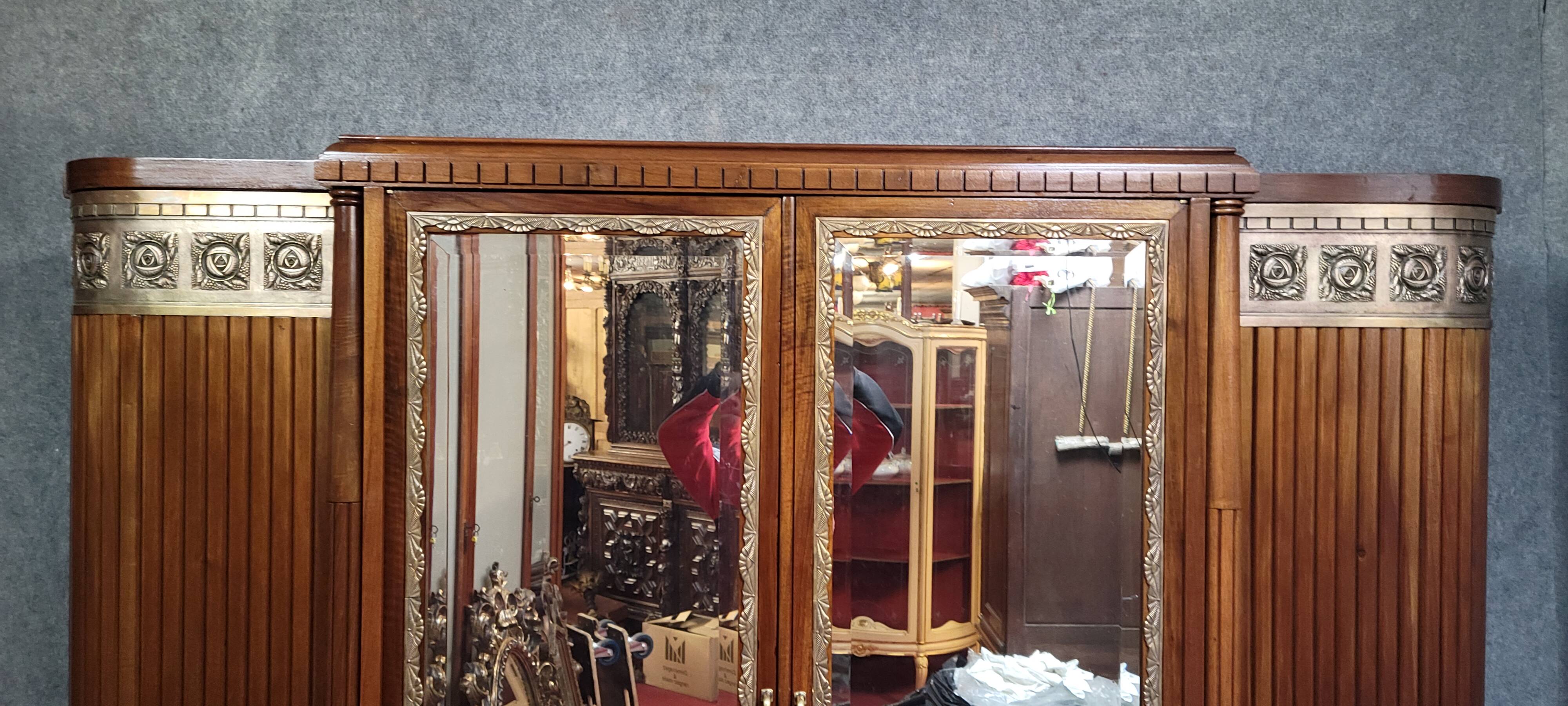 Large Art Deco bookcase wardrobe in mahogany and bronze.