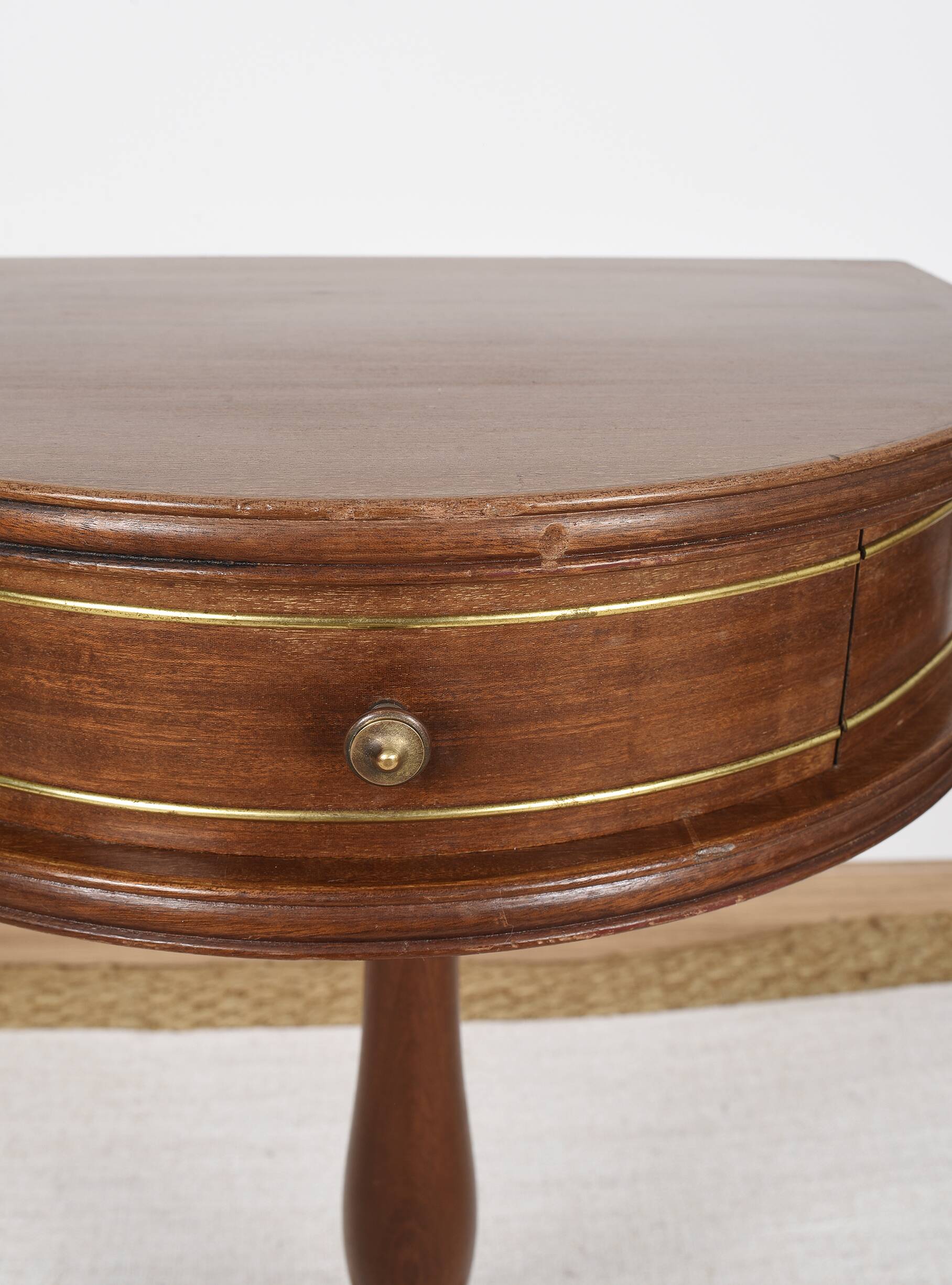 Pedestal table or small side table with drawer.