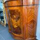 Curved support furniture in floral marquetry – Louis XV style, marble top, late 19th century.