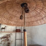 Scandinavian tripod reading lamp in teak and brass.