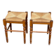 2 square stools made of carved solid wood with rush seats from the 1970s.