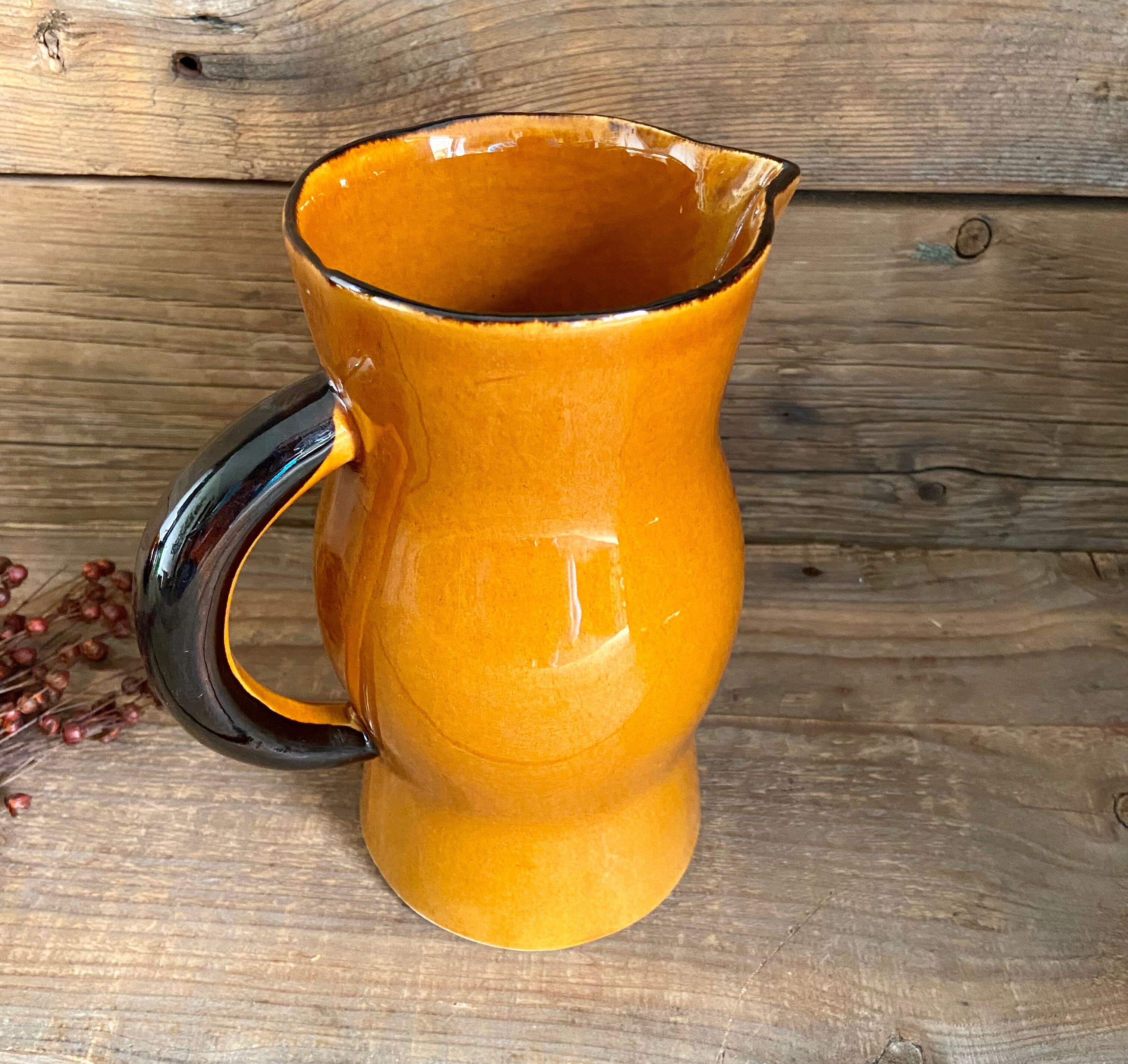 Vintage glazed ceramic pitcher