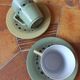 A pair of vintage cups and saucers in glazed stoneware.