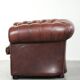 Cowhide Chesterfield armchair in a classic English style