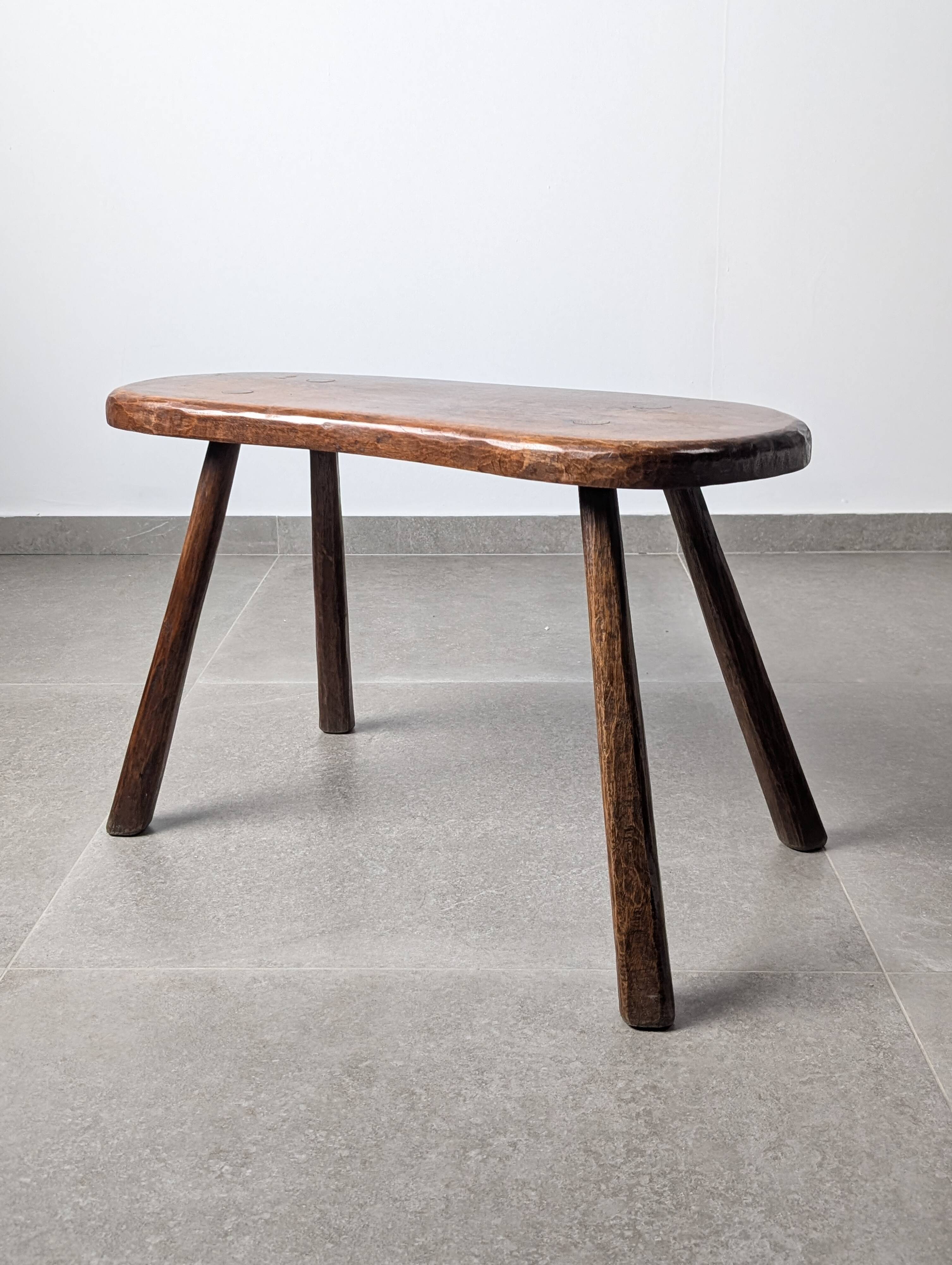 Rustic hand-carved wooden bench with organic shape, 1940s