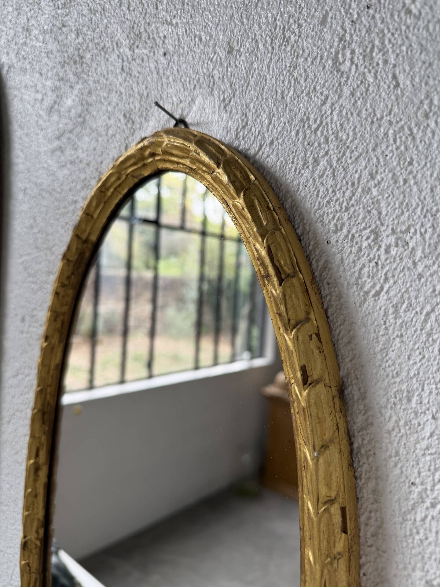 Pair of oval mirrors 1900 gilded stucco