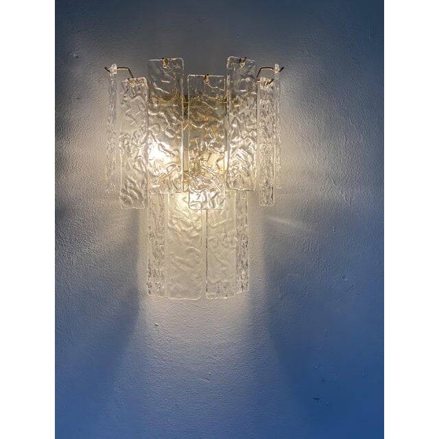 Pair of contemporary hammered strips ”listelli” murano glass wall sconces
