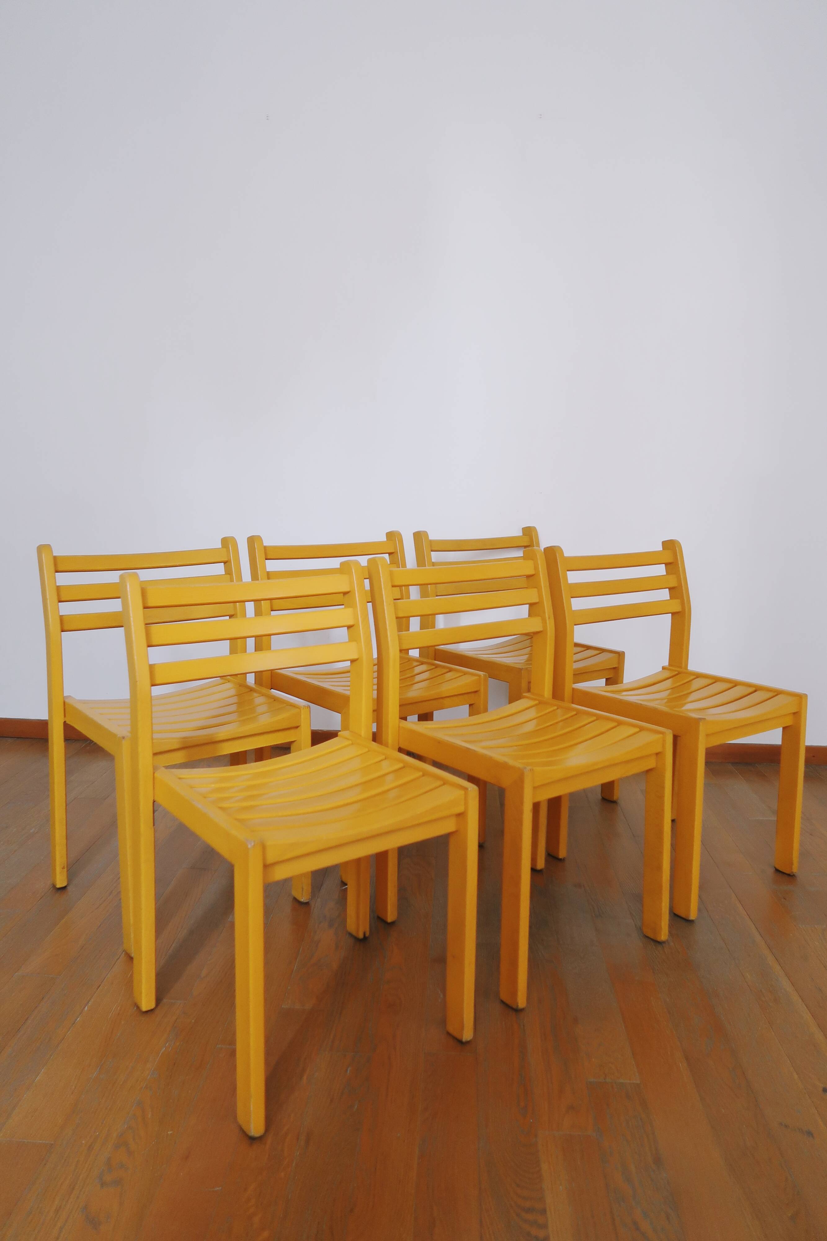 6 stackable wooden chairs