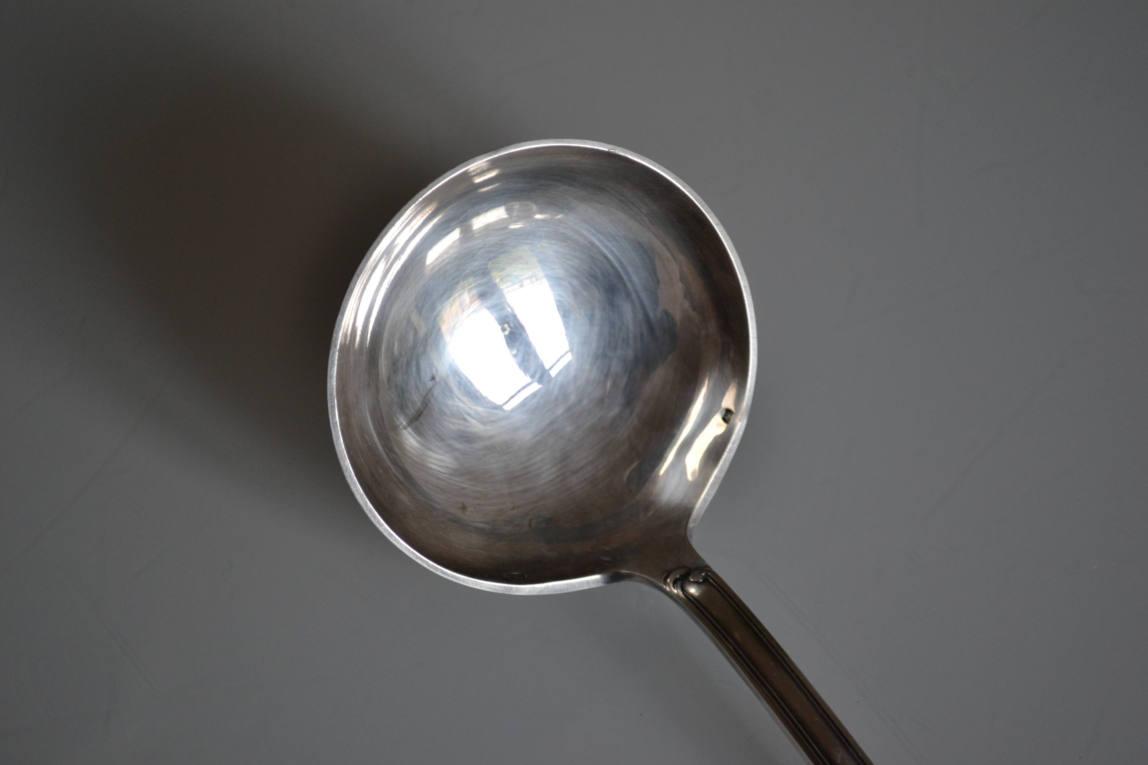 Silver metal ladle goldsmith frionnet francois