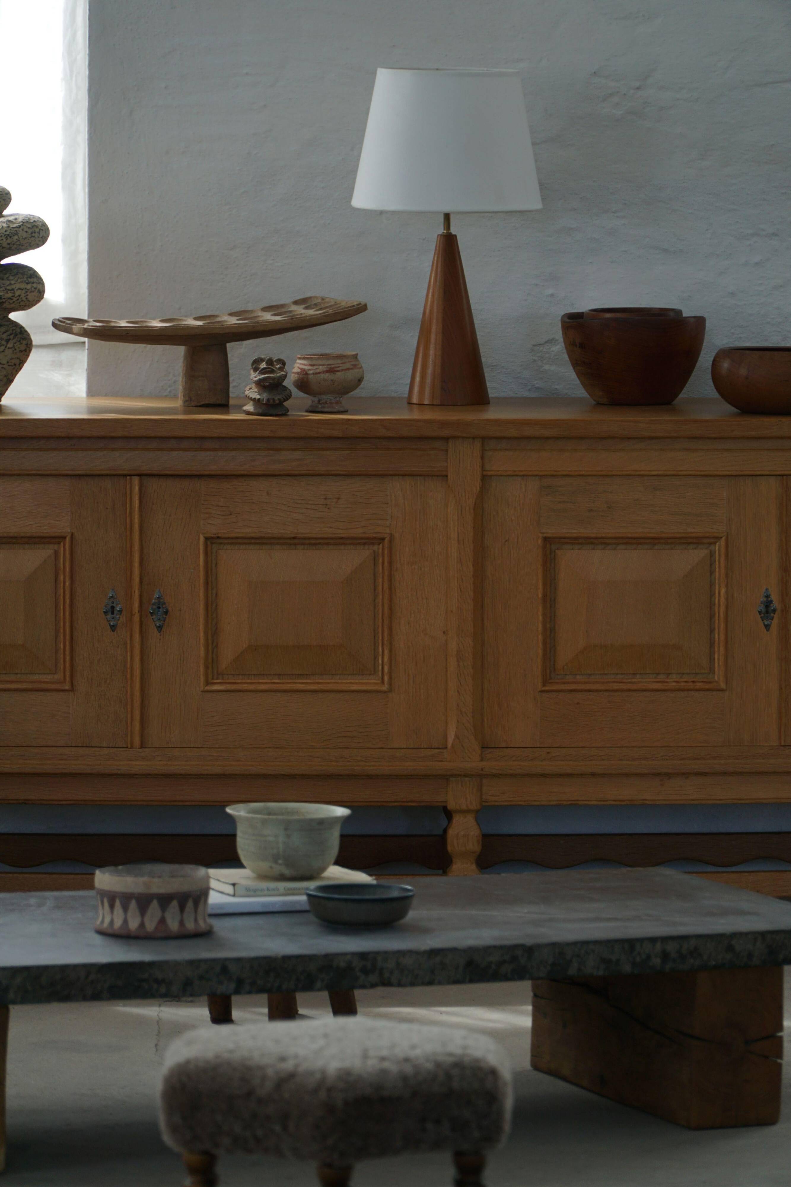 Modern Danish, a conical table lamp in teak, 1980s.
