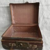 Old metal cardboard suitcase