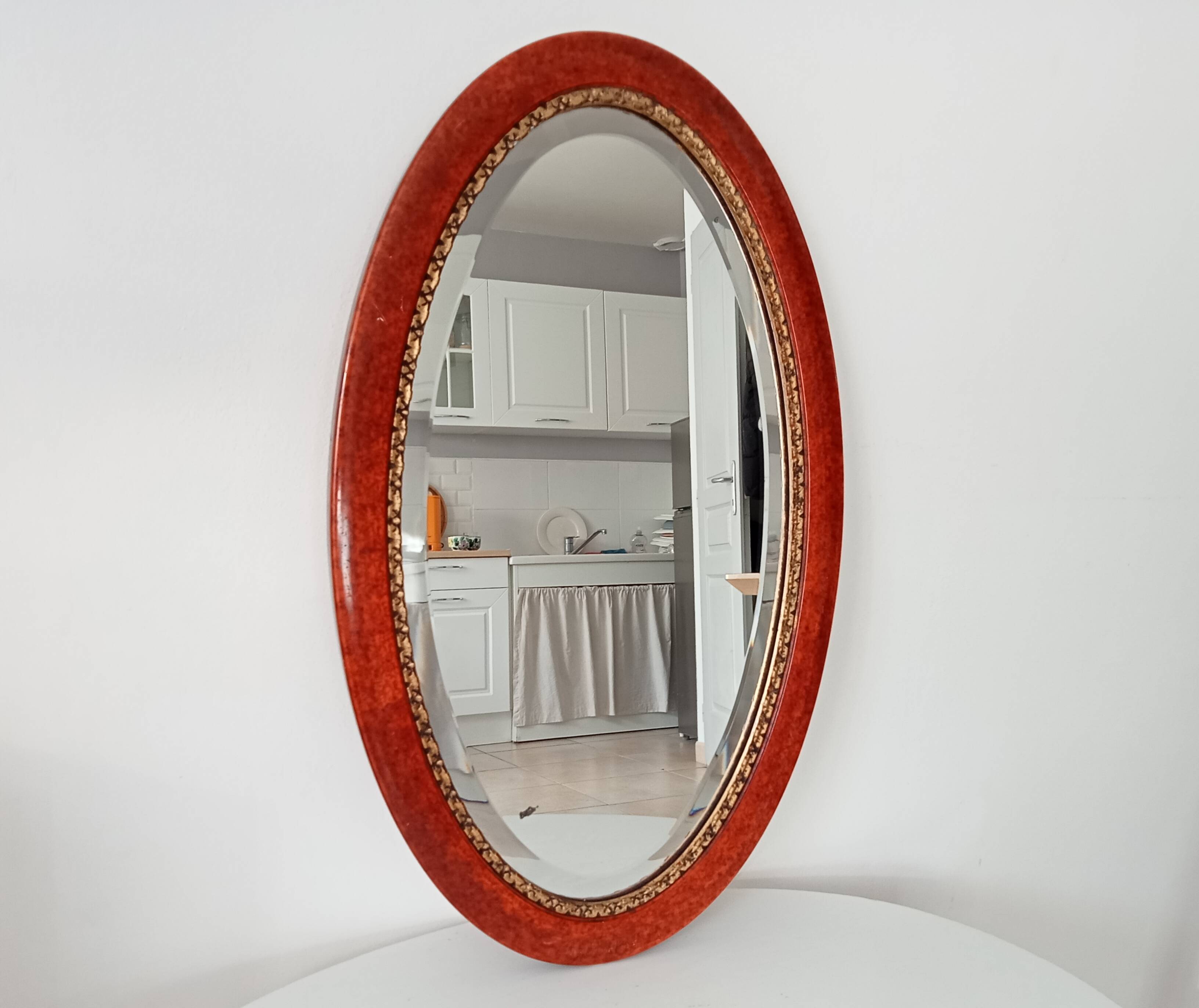 Antique oval mirror with bevelled glass