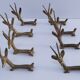 eight vintage brass Gazelle knife rests