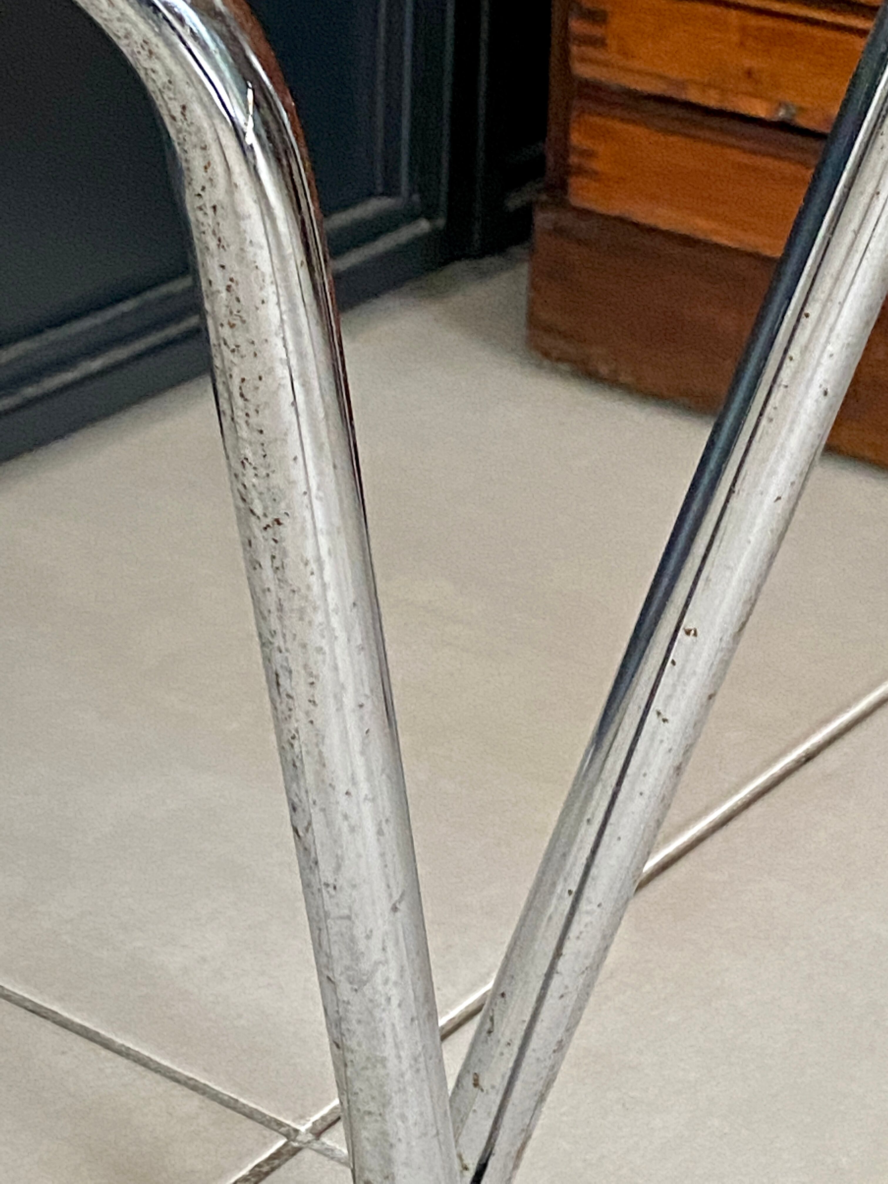 Pair of yellow formica chairs