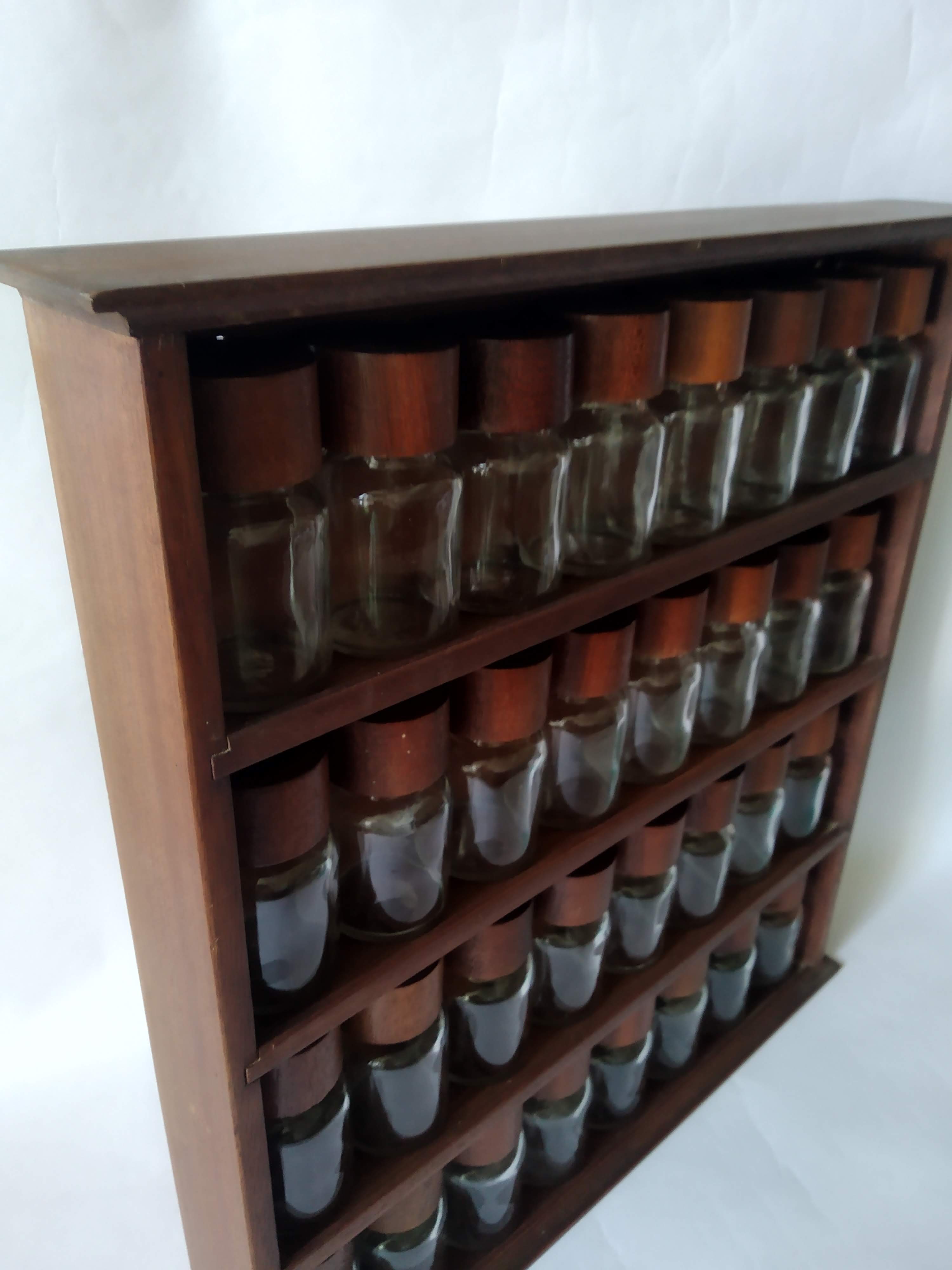 Wooden shelf with 32 vintage Cole & Mason spice jars