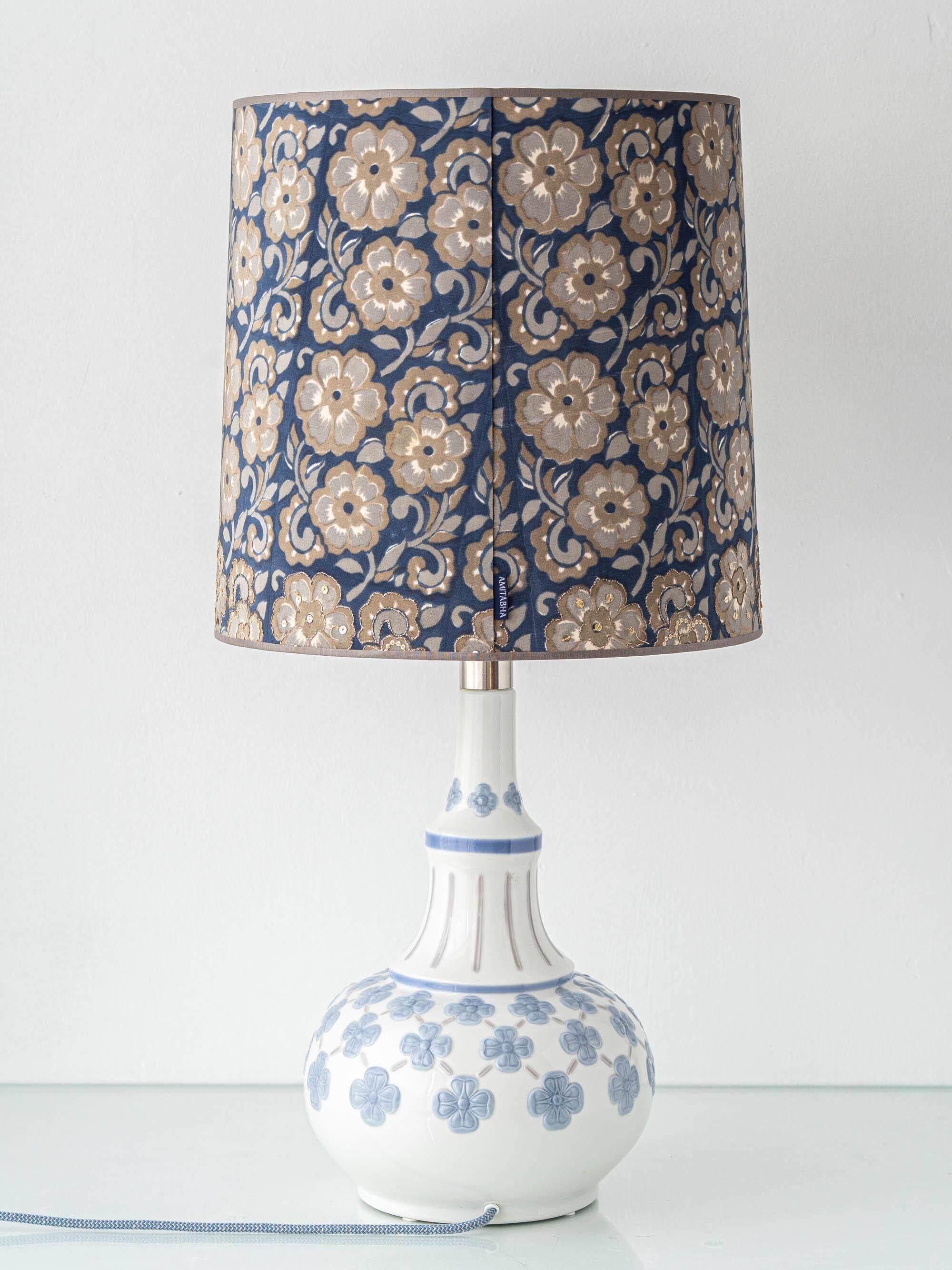 Blue and white porcelain table lamp by Lladró with floral shade in new silk.